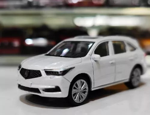 White diecast Acura MDX SUV toy car, front three-quarter view