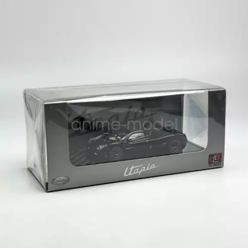 1/64 scale black diecast car model in display box with clear window