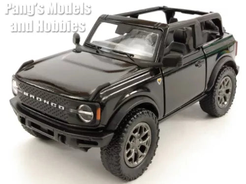 Black open-top diecast SUV model with front 3/4 view and detailed grille