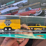 Diecast car with yellow trailer and red 1979 Chevrolet K5 Blazer model