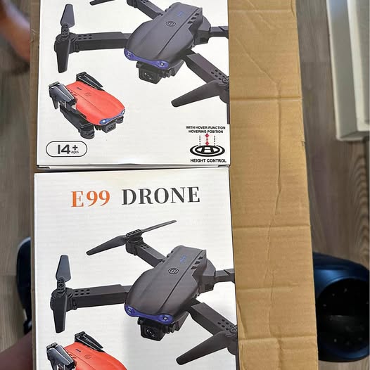 E99 drone box showing a gray quadcopter with four propellers and camera