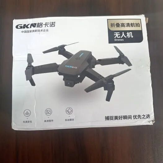 Drone product box with quadcopter illustration and accessories icons