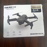 Drone product box with quadcopter illustration and accessories icons