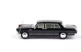 Black diecast luxury sedan model car with detailed wheels and windows