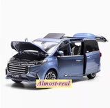 Blue 1/18 diecast MPV model car with open hood and front grille detail