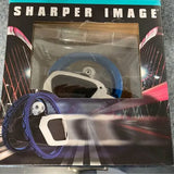 Sharper Image drone in retail box with blue ring and gray body