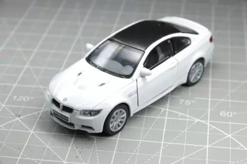 White BMW M3 coupe diecast toy car with detailed grille and headlights