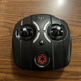 Propel drone remote controller with twin joysticks and red emblem button