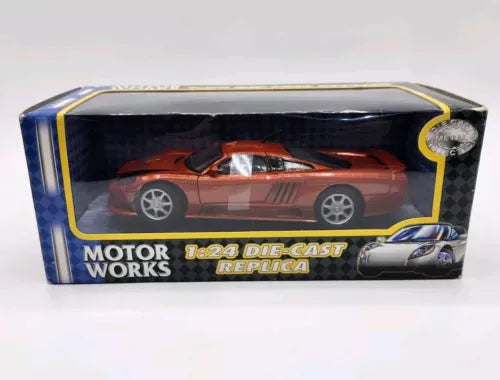Orange 1:24 die-cast model car with Motor Works replica in display box