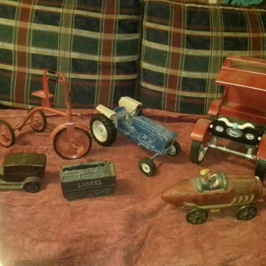 Diecast cars set with multiple miniature vehicles, including truck and sports car