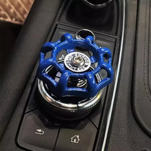 Blue diecast toy car wheel and body in a display compartment
