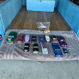 Diecast car collection with 10 small toy cars, mixed colors and styles