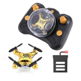 Mini remote drone kit with gold quadcopter and handheld controller