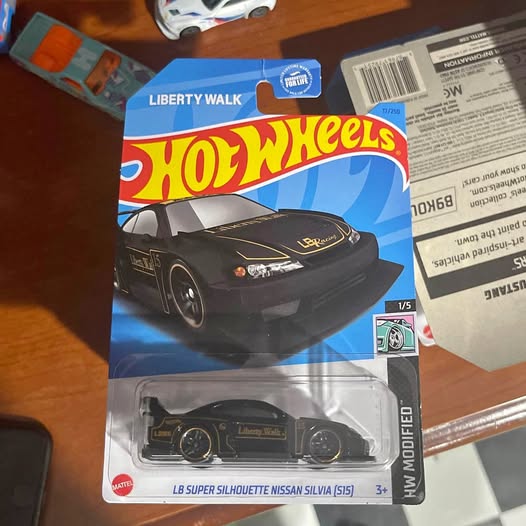 Hot Wheels LB Super Silhouette diecast car, black Liberty Walk Nissan Silvia in blister