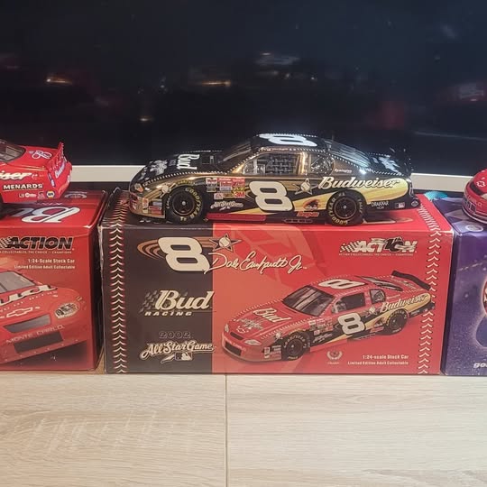Diecast car set in display box with red race car graphics and #8