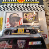 Die-cast stock car with driver card, displayed in clear retail box