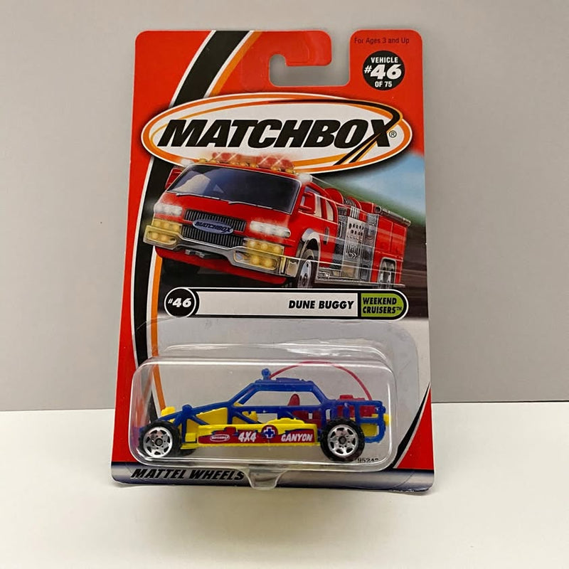 Matchbox diecast dune buggy car, blue and yellow, in blister packaging