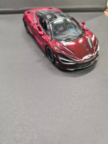 Cherry red diecast toy car model with detailed front and side profile
