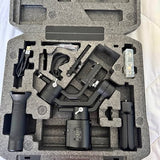 Drone accessories kit with foam insert, controller, cables, and spare parts