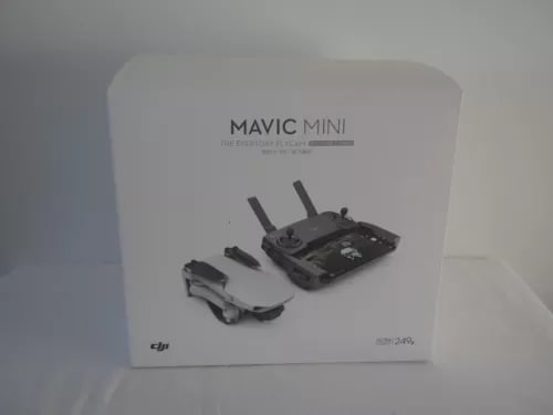 DJI Mavic Mini Fly More Combo box with drone and controller, showing contents