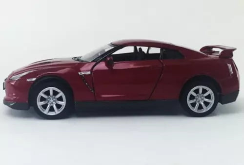 Red diecast toy sports car model, side view with silver wheels