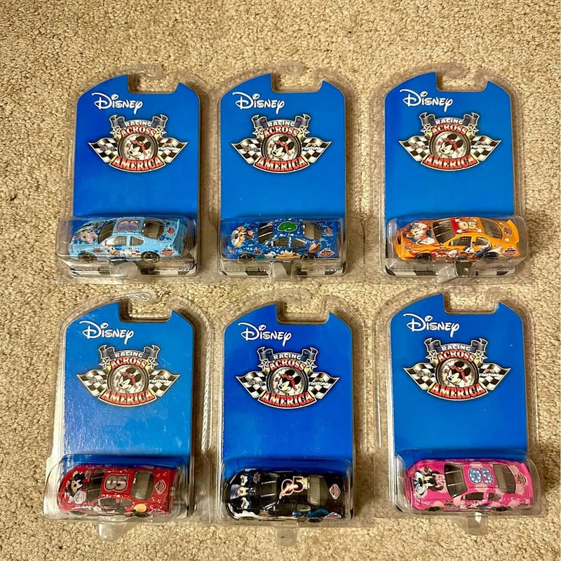 Diecast NASCAR car set, 6 cars in blue blister packs with Disney Racing Across America logos