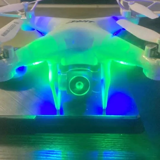 JJRC quadcopter drone with front camera lens and LED lights
