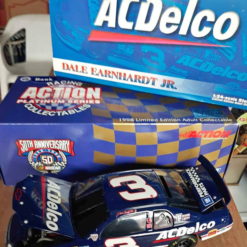 Blue and black #3 diecast race car bank in Action Collectables box