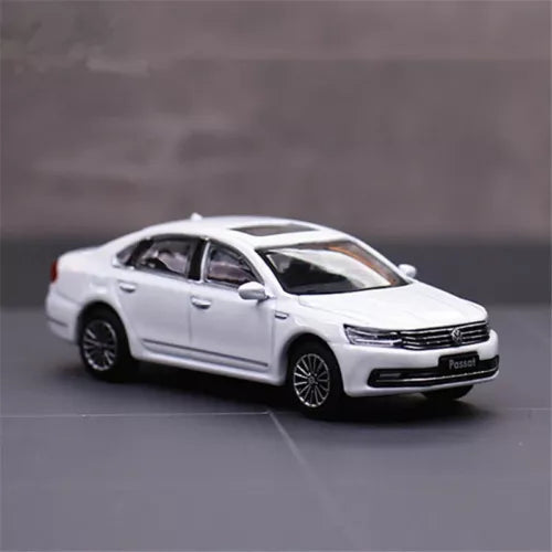 Diecast Volkswagen Passat car model, white sedan with detailed front grille and headlights