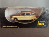 Diecast model car of a cream and red 1970 Tatra 603/1 in box