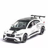 White 1/36 diecast model car with black wheels, front 3/4 view
