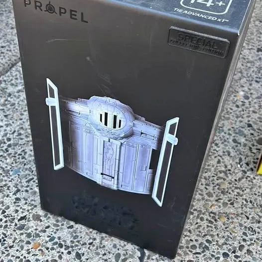 Propel Tie fighter drone retail box with light gray spacecraft illustration
