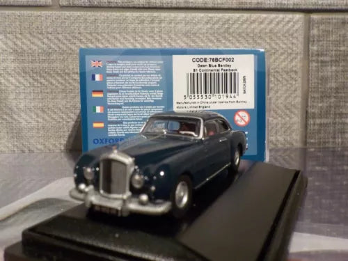 Bentley S1 Continental Fastback diecast model car, dark blue/black, on display base