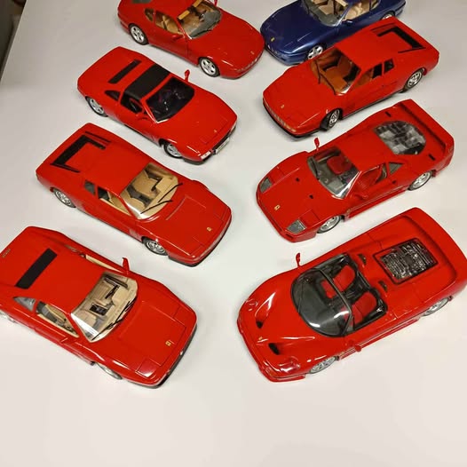 Red Ferrari 1/18 diecast car set, multiple angles with open cockpit