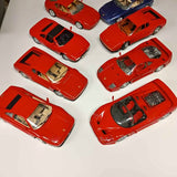 Red Ferrari 1/18 diecast car set, multiple angles with open cockpit