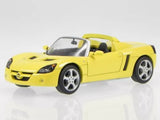 Yellow convertible diecast model car with open cockpit and silver wheels