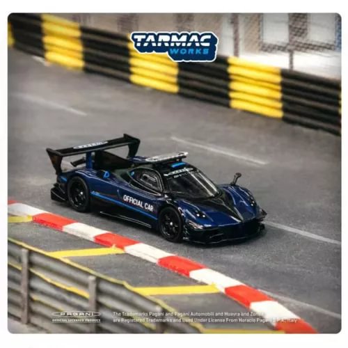 Blue and black sports car diecast model with rear wing, scale model