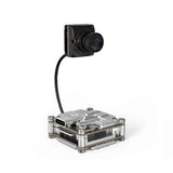 Compact camera drone with silver metallic body and front lens module