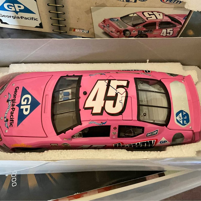 Pink NASCAR diecast stock car with #45 graphic and open wheels