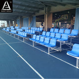 Aluminum bleachers with blue plastic seats, 3 rows and metal support frames