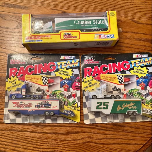 NASCAR diecast racing team cab and trailer in blister box, green and white truck