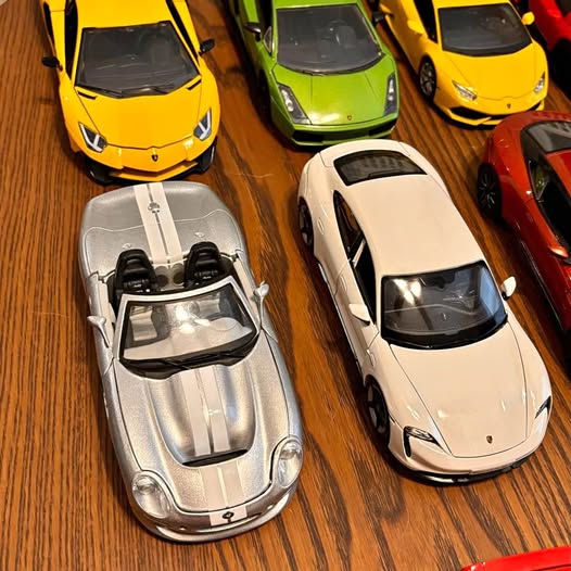 Diecast toy cars assortment, silver, white, yellow, green and red models
