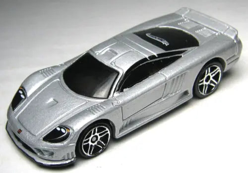Silver diecast sports car with black hood and roof, detailed wheels