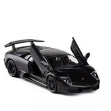 Black diecast sports car model with open scissor door, front view