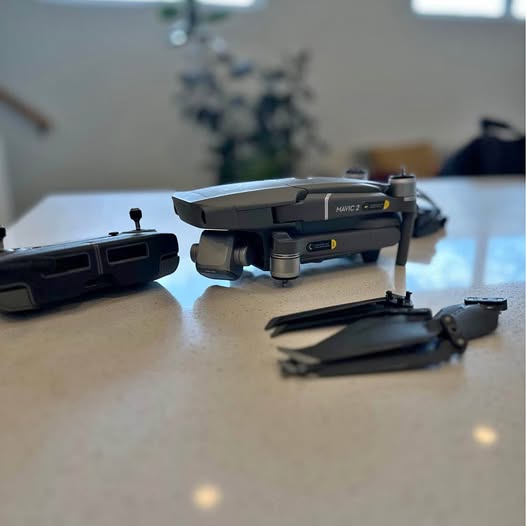 DJI Mavic 2 Pro drone with controller and spare propellers