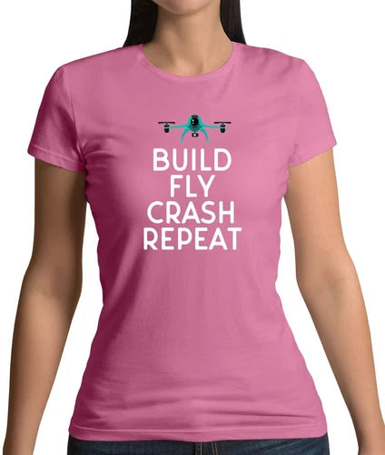 Women’s purple T-shirt with drone graphic and BUILD FLY CRASH REPEAT text