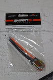 Drone cable connector in clear packaging, orange-and-black wires with metal pins