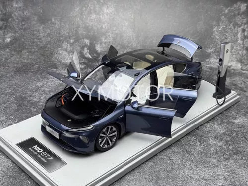 1:18 NIO ET7 diecast model car, blue with open doors, on display base