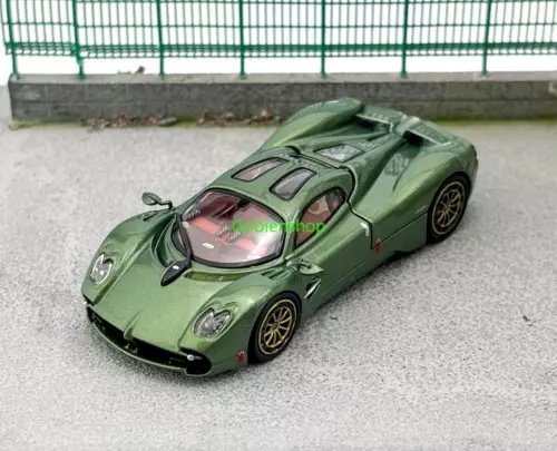 Green diecast sports model car with black wheels, front 3/4 view