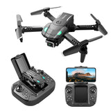 Toy quadcopter drone with camera, plus handheld controller with display